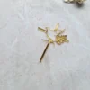 Krzyżyk z gołębiem